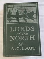 Front cover of antique hardcover book 'Lords of the North' by A.C. Laut with green cloth and silver embossed text and canoe image.