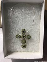 Cross pendant with gemstones and chain in gift box