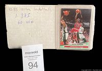 Box of 1992-93 Fleer Ultra basketball cards with handwritten label showing set number and price, featuring Michael Jordan card on top