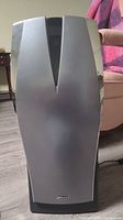 Front view of Bionaire air cleaner with silver and black design, showing the overall shape and size.