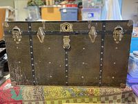 Front exterior view showing central hasp, locks and toggle latches