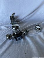 Image of chrome Reese Towpower Tri-Ball trailer hitch showing the three balls and mount.