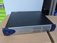 Front and top view of Avid 192 I/O audio interface showing brand and model logo with sample rate and sync mode LED indicators.