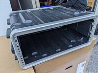 Front open view of the black SKB 4-space rack hard case body showing interior and missing front cover.