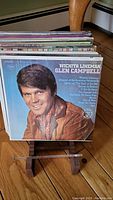 Front cover of Glen Campbell's 'Wichita Lineman' vinyl record, showing the artist in a brown jacket.