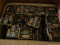 Box full of approximately 25 Gleams Ball toys in original packaging.