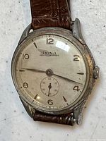 Another angle of vintage Doxa wristwatch showing overall wear on case and strap