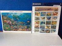 Two sheets of postage stamps; one Pacific Coral Reef scene and one Classic American Aircraft sheet