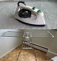 Photo of the white electric iron showing controls and coiled black cord