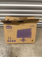 BenQ GW2250 LED monitor in its original cardboard box showing model and size details.