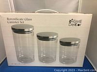 Box packaging showing branding, three borosilicate glass canisters sizes 1335 ml, 900 ml, and 750 ml.