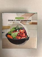Box front showing basket filled with fresh vegetables including tomatoes, cabbage, and carrots, labeled 'Double Layer Separation'