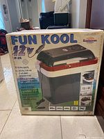 Box showing the Fun Kool 12V P-25 cooler with 24 litre capacity and power plug image.