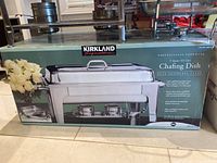 Box showing Kirkland Signature branding and image of the chafing dish