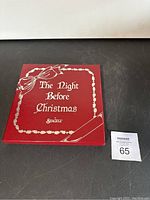 Red box with gold decorative border and text The Night Before Christmas by Seagull
