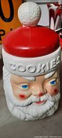 Front view of Santa Claus cookie jar showing facial details and 'COOKIES' embossing.