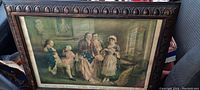 Full view of the framed lithograph print showing a colonial scene with Betsy Ross and others around an American flag under construction.