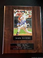 Full view of wood plaque with Mark McGwire autographed photo and engraved plates.