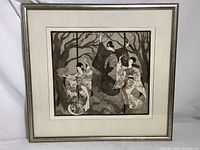 Full view of the framed print showing three dancers in garden setting with silver-tone frame and silk mat.
