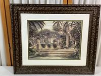 Full view of the framed print showing ornate dark wood frame and villa steps print.