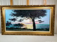 Full frontal view of the painting and frame