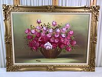 Full view of original painting showing a basket of pink and white roses with gold ornate frame.