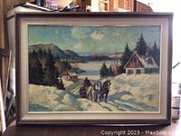 Framed full view of winter Quebec landscape featuring horses hauling logs
