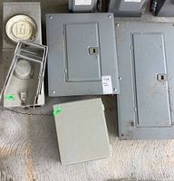 All four panels and boxes on concrete floor