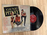 Front cover of Gene Pitney's World Wide Winners vinyl album and the black vinyl record with a red United Artists label.