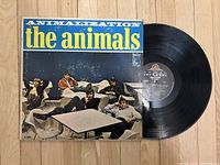 Front album cover of Animalization by The Animals vintage vinyl showing band members and title artwork.