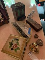 Tabletop view showing all boxes and the cruise ship model together.