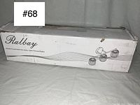 Box labeling showing brand and type of lighting fixture, model description