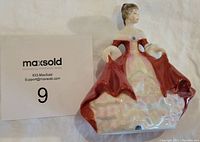 Photo of Royal Doulton Southern Belle porcelain figurine, front view with dress details