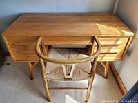 Front view of the oak desk and bentwood chair set