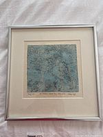 Framed square artist proof print showing the entire artwork with mat and silver frame.