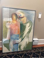 Framed original artwork showing two intertwined abstract human figures in muted pastel colors, depicting an intimate embrace.