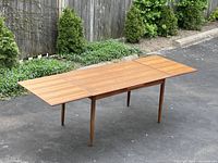 Table fully extended to 98 inches with both leaves open