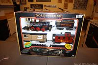 Photo of Gold Rush Express train set box showing all train cars in packaging.