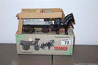 Full view of Texaco limited edition horse and tanker coin bank in original box.