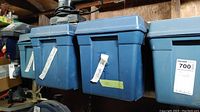 Blue plastic tool boxes, appear damaged, used for storage of tool lot