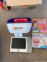 Photo showing Orbeez Foot Bath, Lite-Brite, and two craft kits