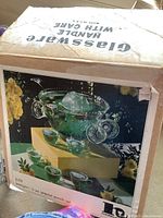 Original box showing image and description of the punch bowl set