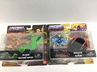 Two packaged Masters of the Universe mini toys, He-Man with Ground Ripper and Skeletor with Roton