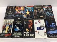 Front view showing the 10 VHS tapes arranged in two rows, titles and cover art visible for identification.
