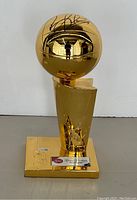 Full front view of the trophy on a neutral background