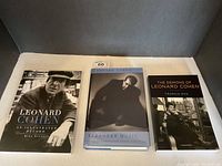Front covers of three Leonard Cohen books side by side