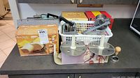 Pasta Facile pasta maker assembled with two metal disks and crank handle