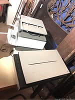 Photo of HP Officejet Pro 9015 printer showing the top and part of the front with paper feeder tray and control panel.