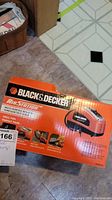 Box for Black & Decker Air Station multi-purpose inflator showing product image, uses, and model number ASI300-CA.
