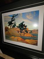 Close-up view of the framed print highlighting the artwork, matting, and signature.